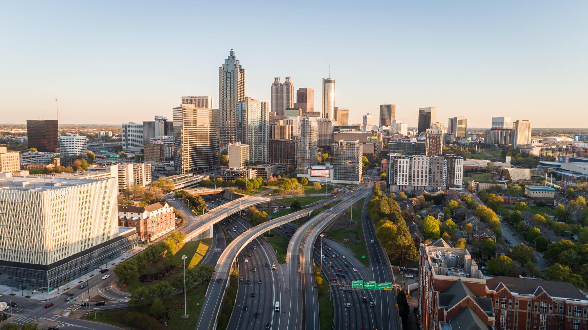Aerial shot over the Atlanta downtown connector during sunset.
