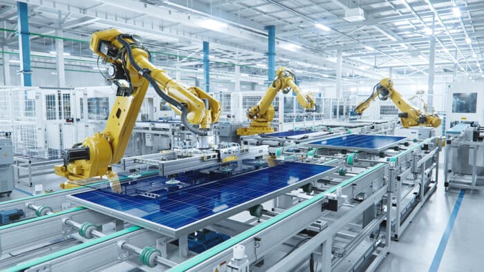 Video For Manufacturing Showing Large Robotic Arms In Factory