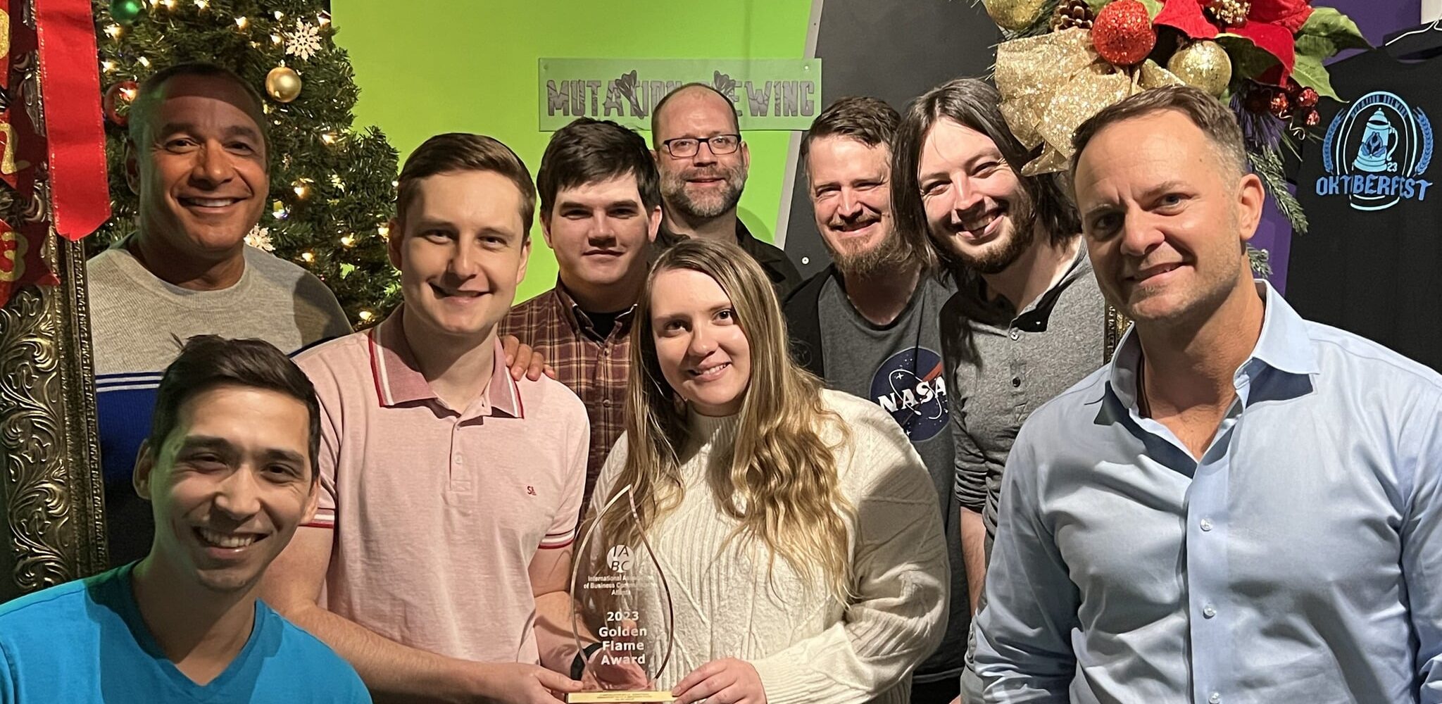 The DVI Group team with their Golden Flame Award from IABC Atlanta 2023