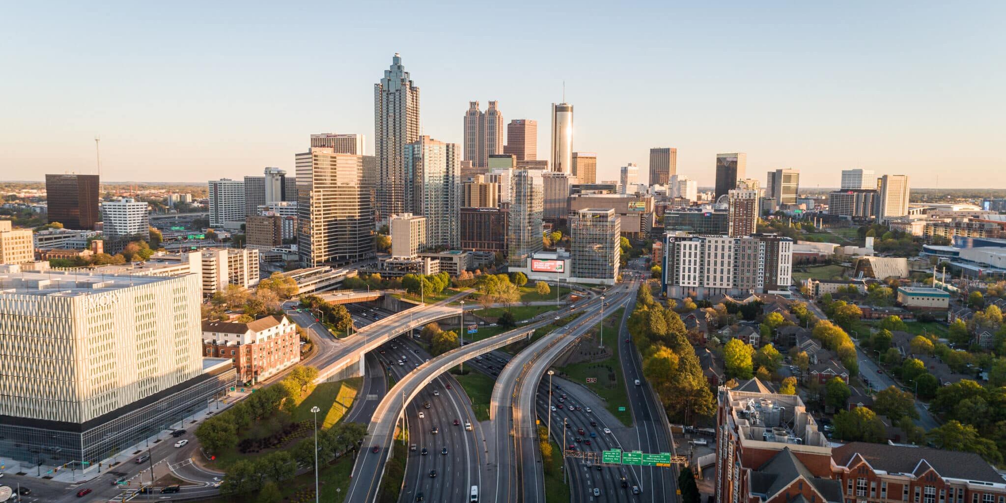 Aerial shot over the Atlanta downtown connector during sunset.