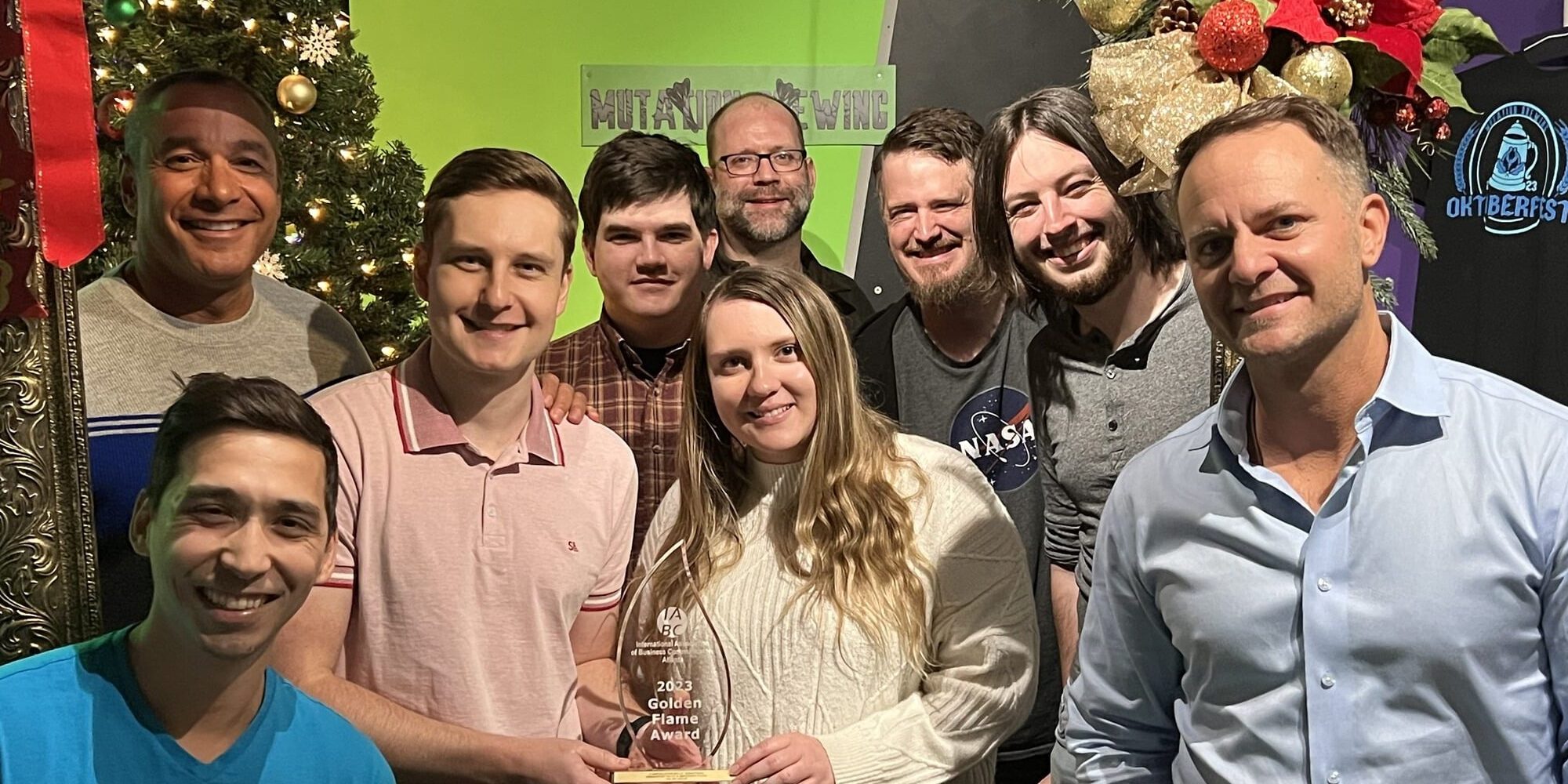The DVI Group team with their Golden Flame Award from IABC Atlanta 2023